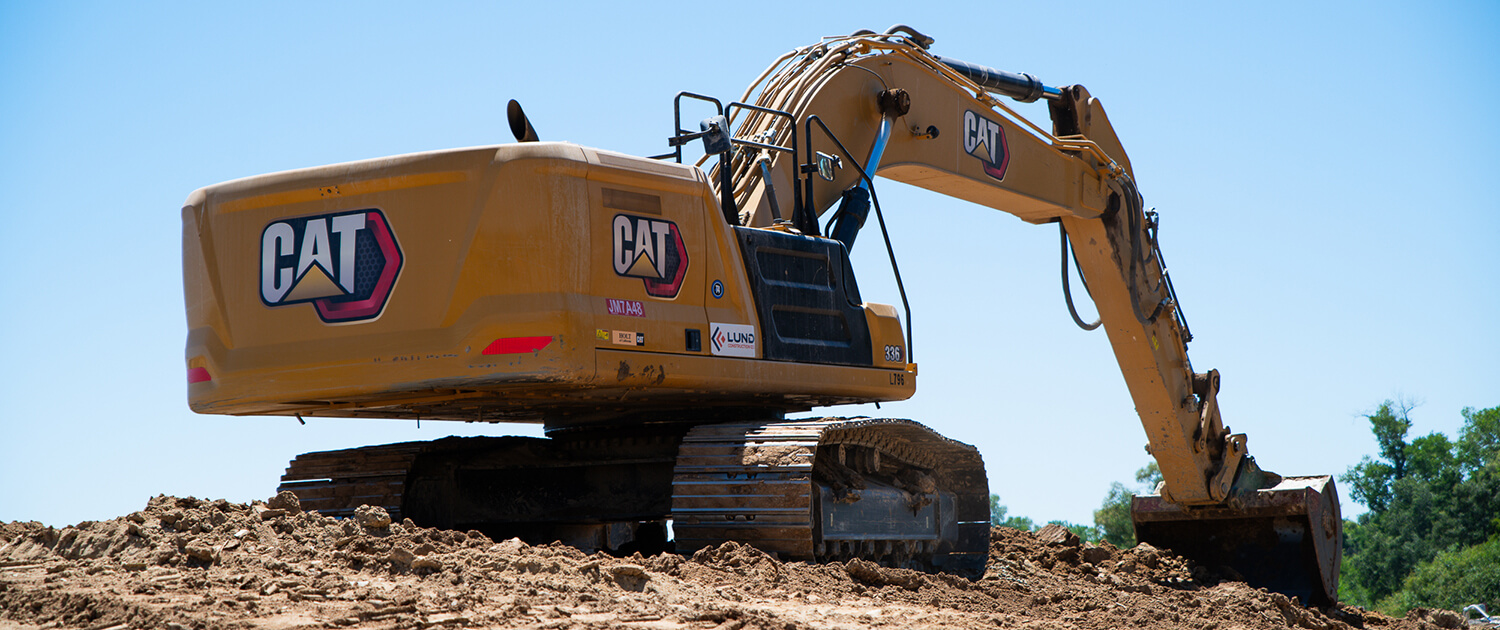 Excavator-on-the-jobsite-Pre-construction-Earthwork-Underground-Utilities